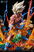 A highly detailed collectible statue of Goku in his Super Saiyan form, posed dynamically amidst stylized orange and blue energy effects on a black background. The Ultra Fine Collection logo is visible in the top-left corner.