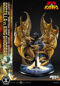 Godzilla vs. King Ghidorah collectible statue by Prime Studio, featuring Godzilla in blue and black with large gold wings clutching a glowing sword, set on a dark illustrated background with product branding and title text.